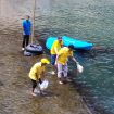 Ketua DPD Partai Golkar Klaten dan Bahtiar Joko Widagdo menaburkan benih ikan nila di Sungai Pusur, Cokro (Dok.Pribadi).